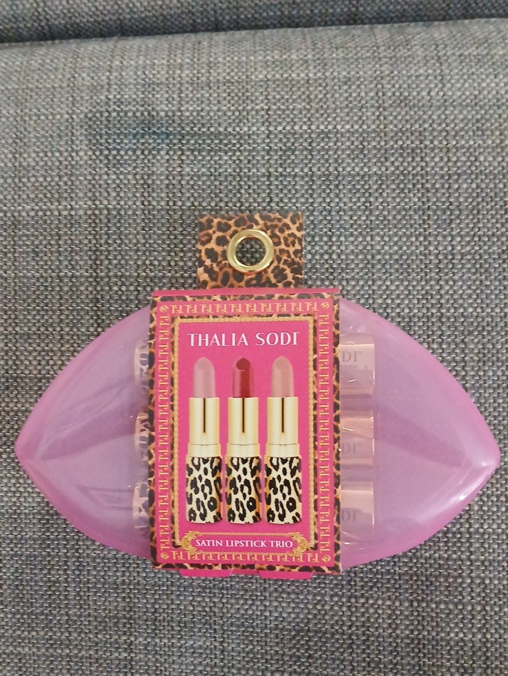 Lipstick trio on pink case